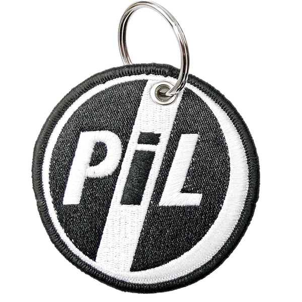 Public Image Ltd Circle kaksipuolinen laastari logolla avaimenperä