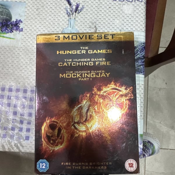 Hunger Games Triple Pack (Box Set) (DVD, 2015) with cardboard. Region 2 Brand New