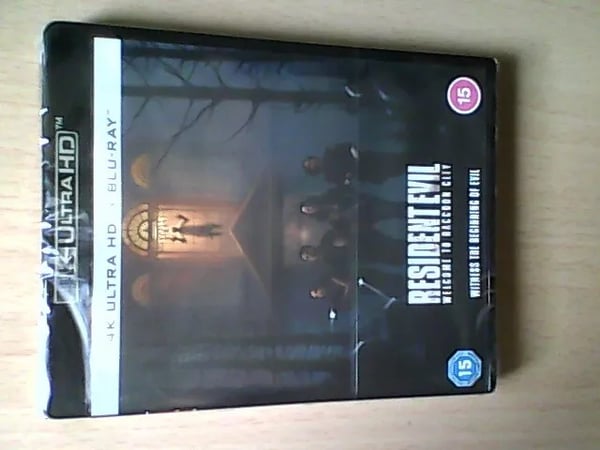 Resident Evil Welcome To Raccoon City 4K UHD AND BLU RAY. Brand New