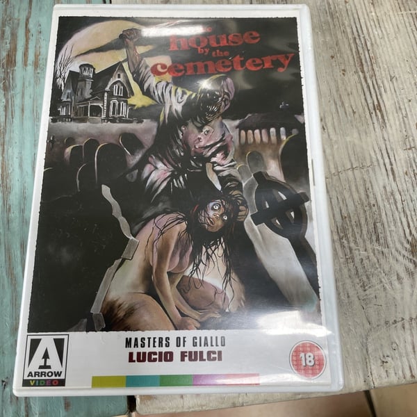Lucio Fulci: House by the Cemetery - DVD julisteella ja vihkolla