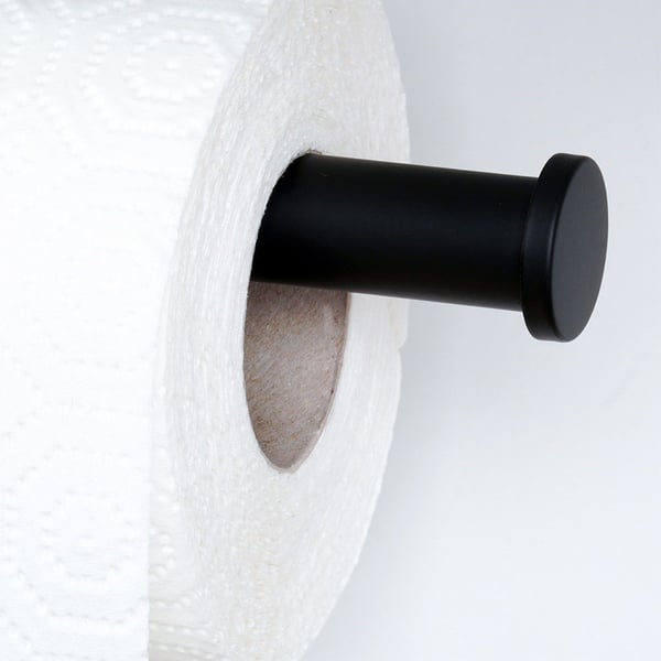 Musta teräksinen paperipyyhkeen teline
