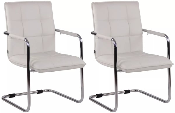 Set med 2 Gandia vita fribärande stolar i konstläder med metallram i krom