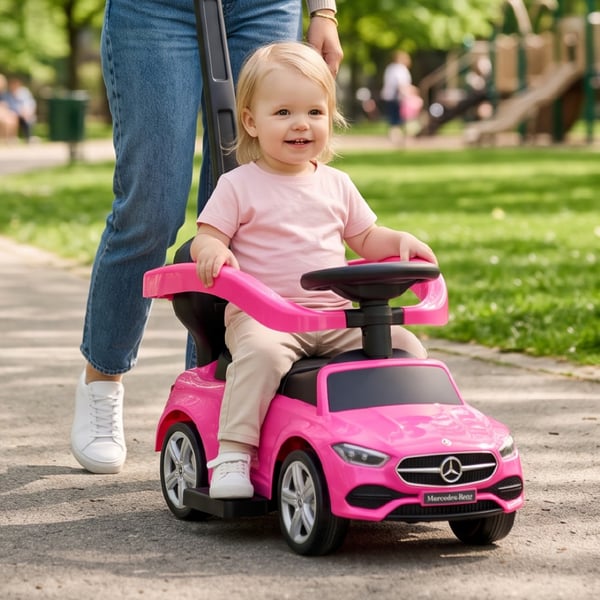 SUN BABY Gåbil för barn Mercedes C-Class från 1 år med skjutstång, ljudfunktion upp till 25 kg rosa