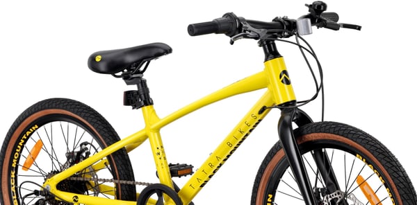 TATRA BIKES Barncykel 20 tum - 6 växlar Shimano - lätt aluminium, justering av styrhöjd, skivbromsar - Gul