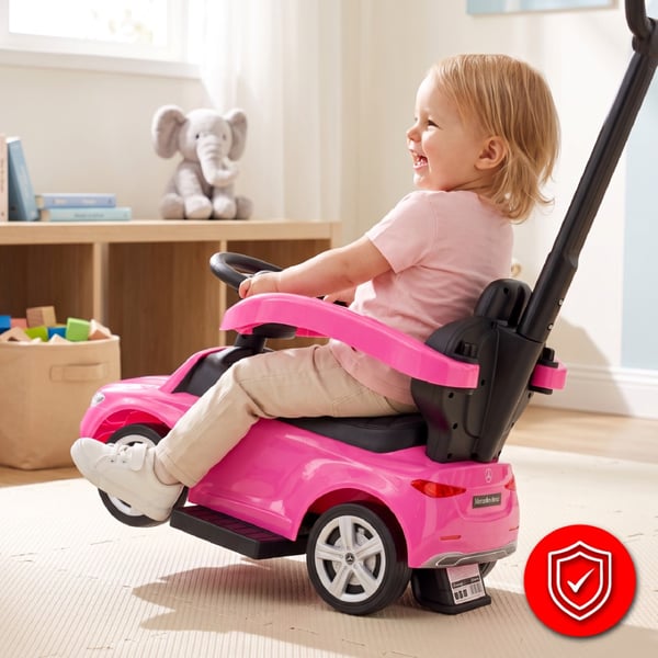 SUN BABY Gåbil för barn Mercedes C-Class från 1 år med skjutstång, ljudfunktion upp till 25 kg rosa