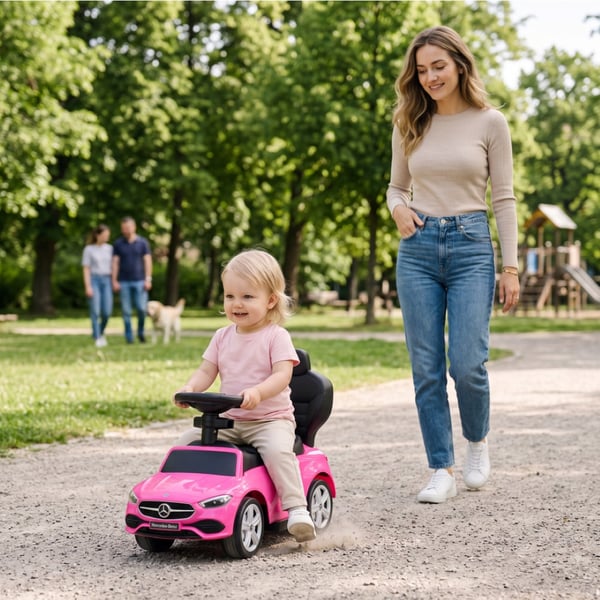 SUN BABY Gåbil för barn Mercedes C-Class från 1 år med skjutstång, ljudfunktion upp till 25 kg rosa