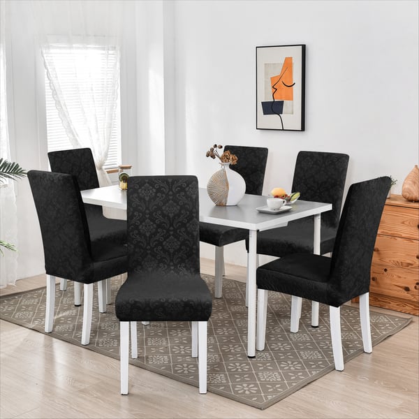Paksu kohokuvioitu samettinen tuolinpäällinen, musta