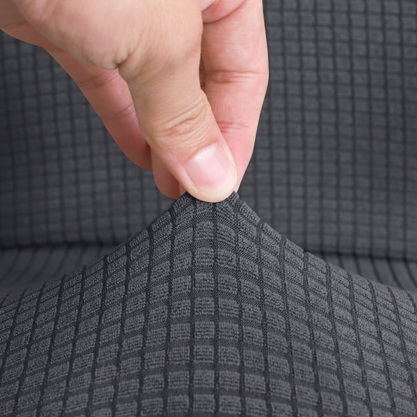 Harmaa jacquard-toimistotuolin päällinen pyörivällä tuolilla
