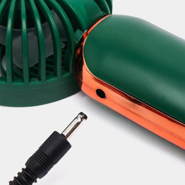 Mini lommeventilator i rosaguld med USB-genopladeligt batteri og stativ