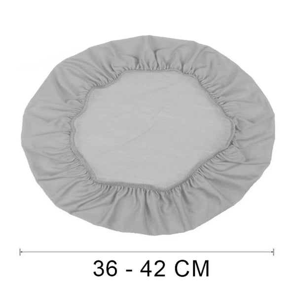 Vaaleanharmaa samettinen pyöreän tuolin istuinpäällinen