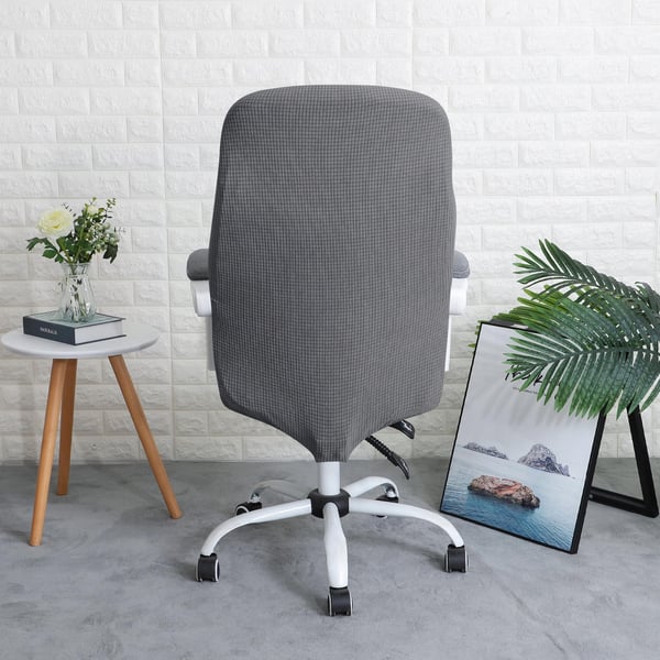 Harmaa jacquard-toimistotuolin päällinen pyörivällä tuolilla