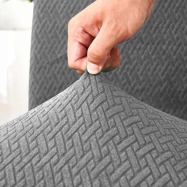 Grått elastiskt jacquard-stolskydd