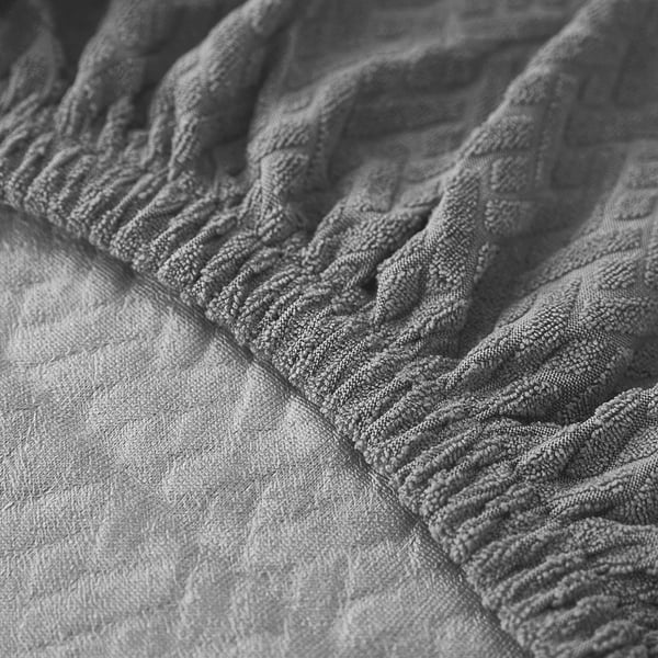 Grått elastiskt jacquard-stolskydd