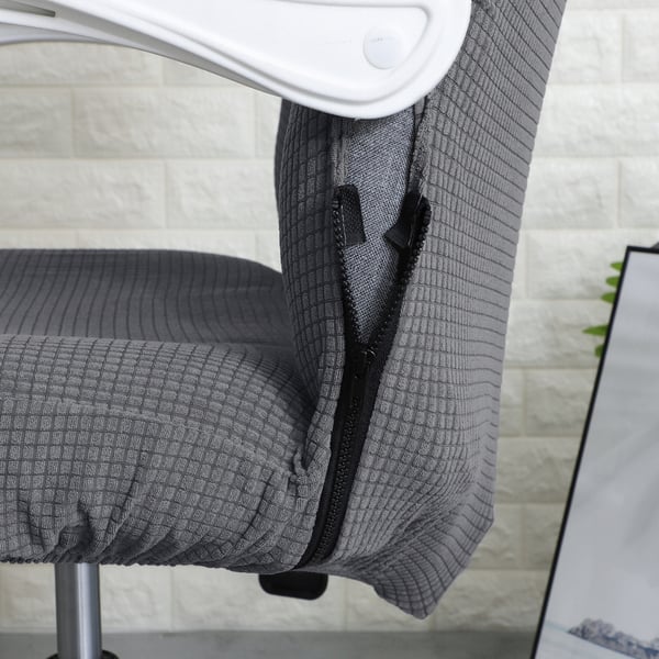 Harmaa jacquard-toimistotuolin päällinen pyörivällä tuolilla