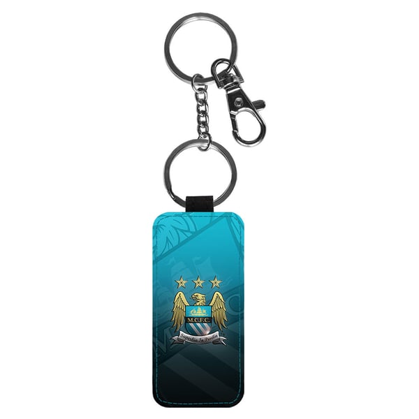 Avaimenperä: Manchester City, tyylikäs riipus, jossa on eloisa ja uniikki kuvio Avaimenperä: Manchester City, tyylikäs riipus, jossa on eloisa ja uniikki kuvio