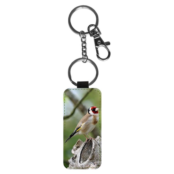 Avaimenperä: Bird Goldfinch, tyylikäs riipus, jossa on eloisa ja uniikki kuvio