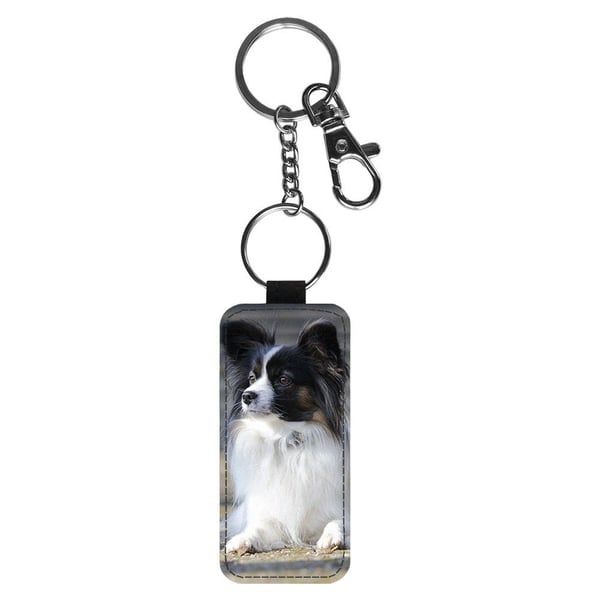 Nyckelring: Papillon Hund, stilrent hängsmycke med livfull och unikt design