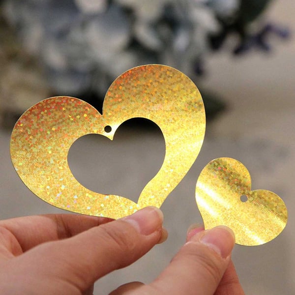 Glitterdraperi med hjerter Metallisk gull