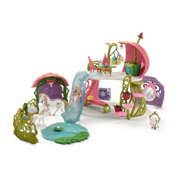 schleich® BAYALA Glittrande blomhus med enhörningar, sjö och stall 42445