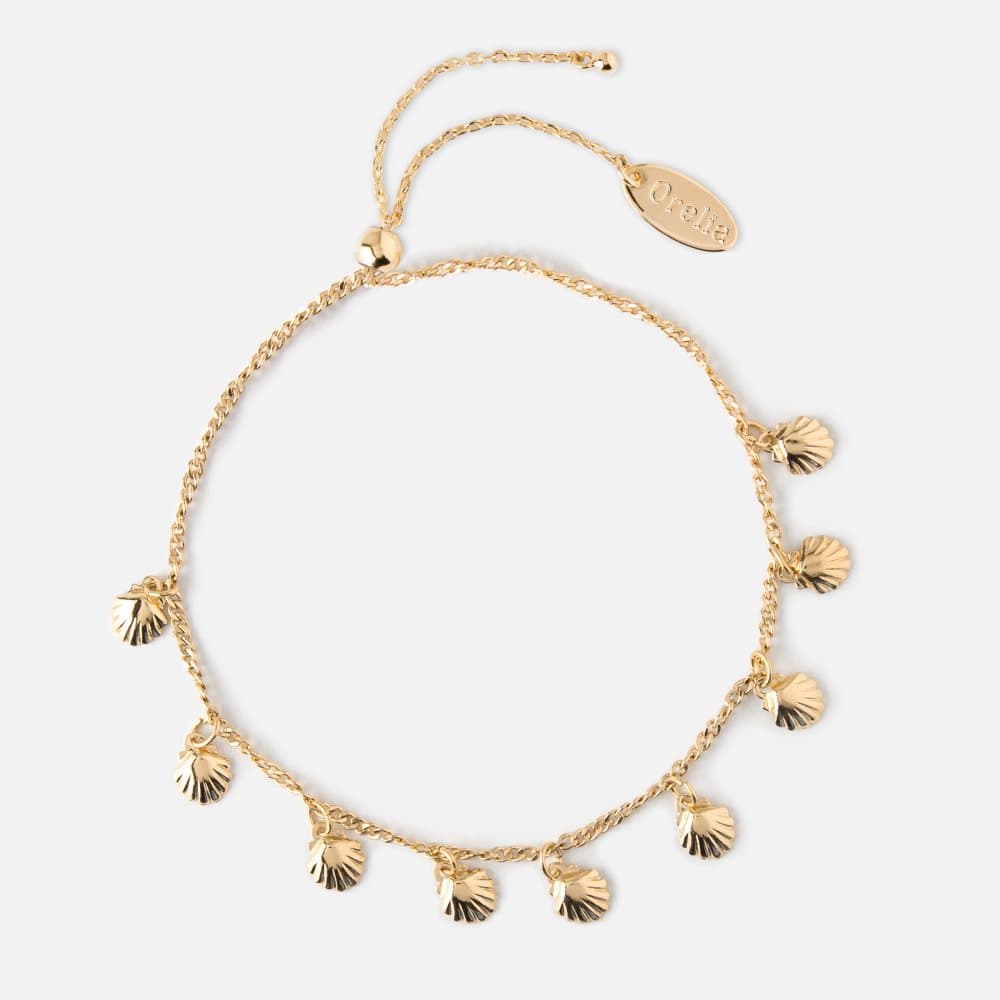 Gullarmbånd med skjell charms