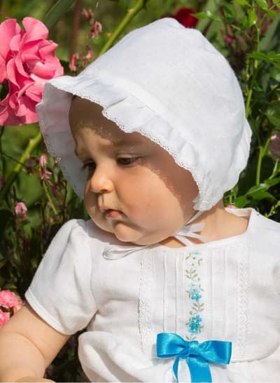 Christening bonnet in white linen from Grace of Sweden
