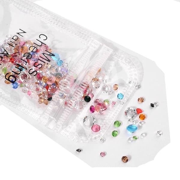 nageldekor bling i olika mått färg diamanter