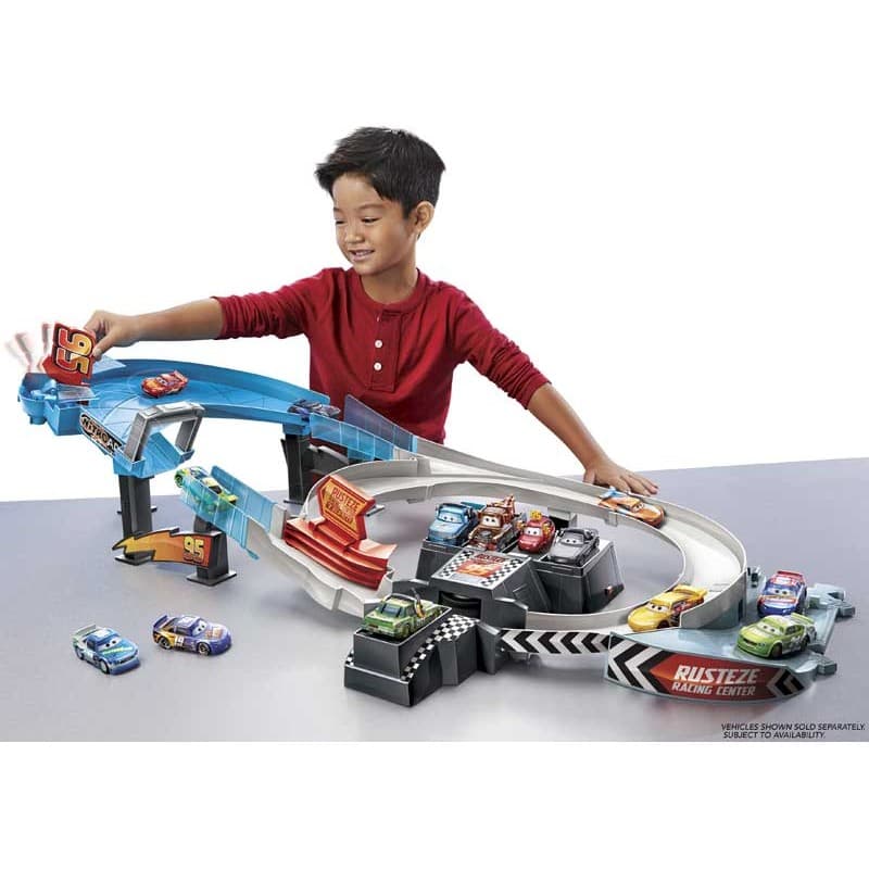 Disney Pixar Cars Rusteze Jump & Drift Racing Play Set
