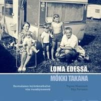 Loma edessä, mökki takana