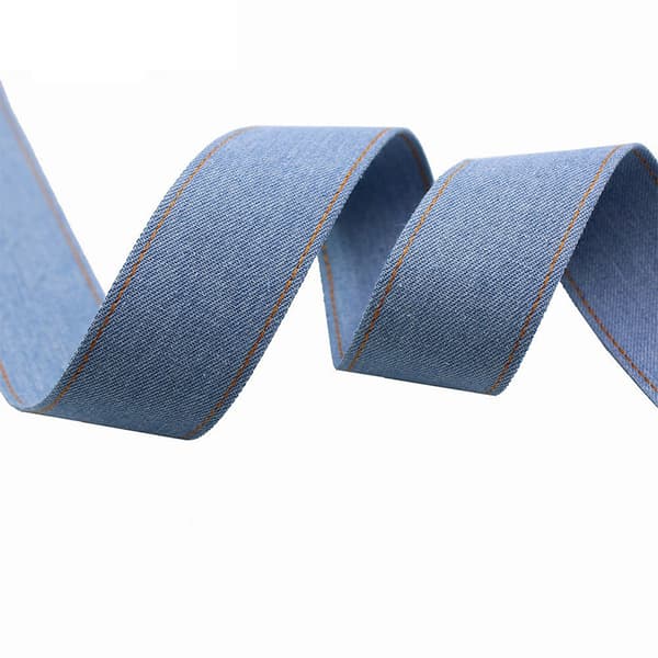 INF Denimvev med gule sømmer - lys farge, 4 cm bred