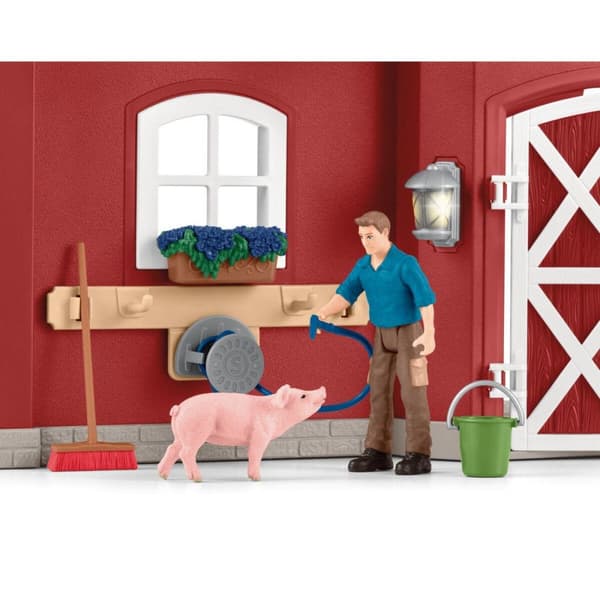 schleich® FARM WORLD Stor röd lada med djur och tillbehör 42606