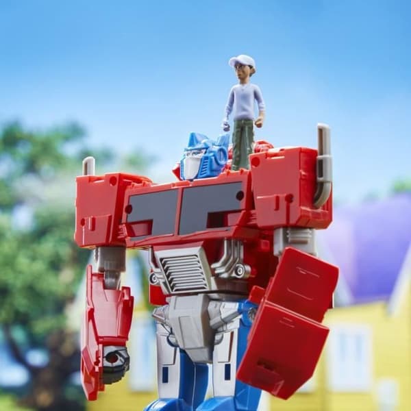 Transformers EarthSpark Spin Changer Optimus Prime 8-tums figur med 2-tums Robby Malto
