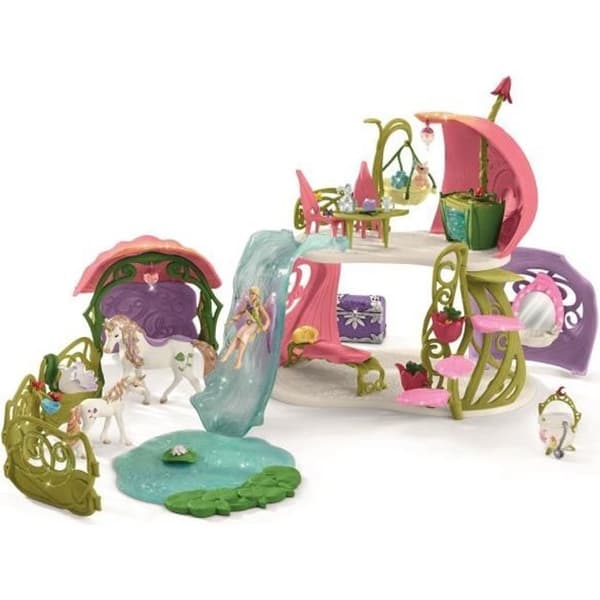 SCHLEICH glittrande blomsterhusfigur med enhörningar, sjö och stall - barn - modell 42445