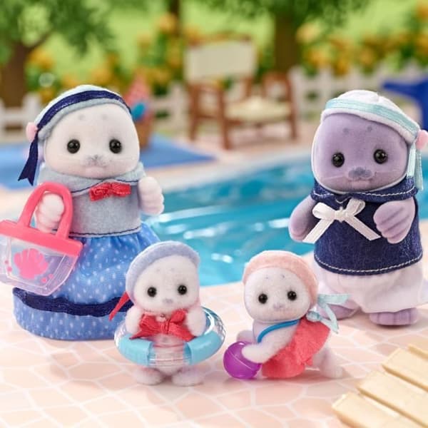 Ledad familj - SYLVANIAN FAMILIES - Sälfamilj - 4 karaktärer och strandtillbehör