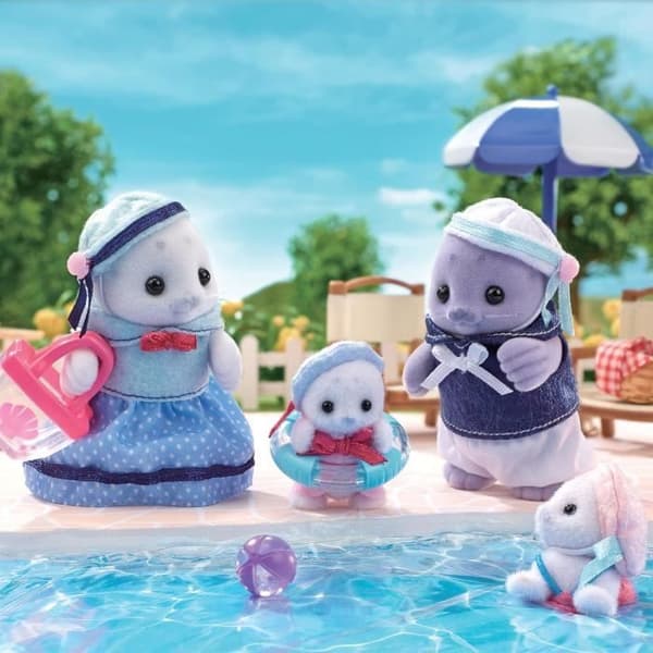 Ledad familj - SYLVANIAN FAMILIES - Sälfamilj - 4 karaktärer och strandtillbehör