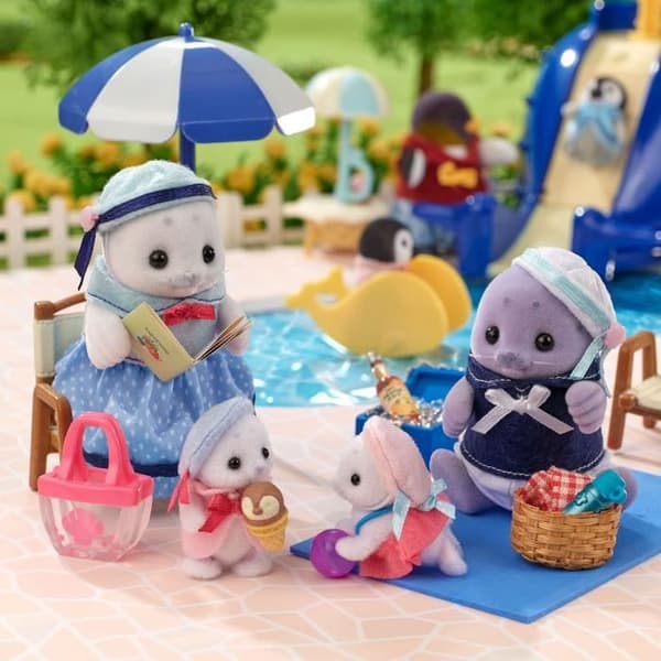 Ledad familj - SYLVANIAN FAMILIES - Sälfamilj - 4 karaktärer och strandtillbehör