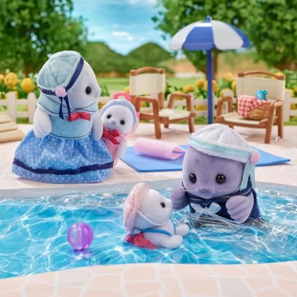 Ledad familj - SYLVANIAN FAMILIES - Sälfamilj - 4 karaktärer och strandtillbehör