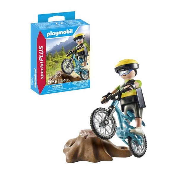 Cyklist med mountainbike och trädstam