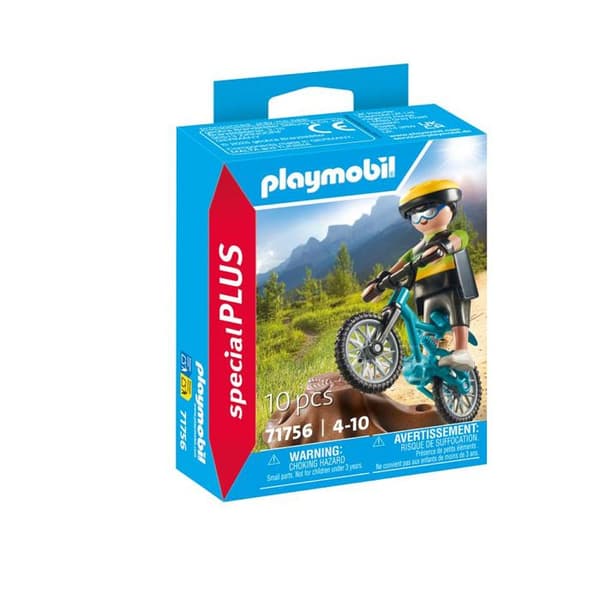 Cyklist med mountainbike och trädstam