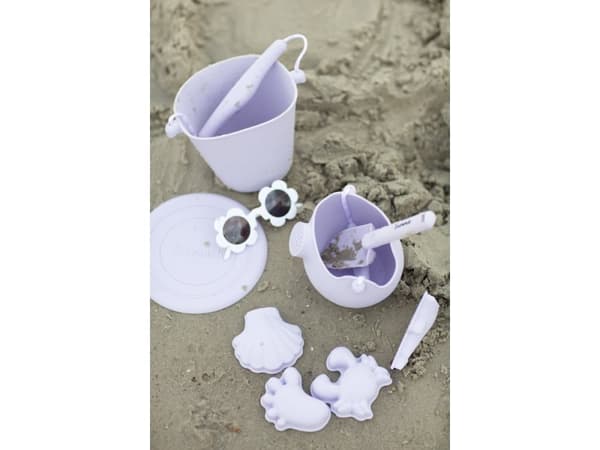 Scrunch-watering-can - lyslilla