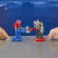 Miniatyrbillede 5 af 6: 2-pak Optimus Prime (Orion Pax) og Megatron (D-16) 11 cm actionfigurer, legetøj til 6-årige, Transformers One Robot Battlers
