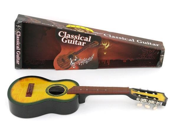 Wooden string guitar in a box 507029