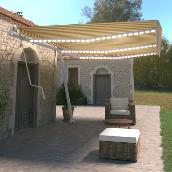 vidaXL Sisäänkelattava markiisi LED/tuulisensori 600x350 cm keltavalk. - Markiisit