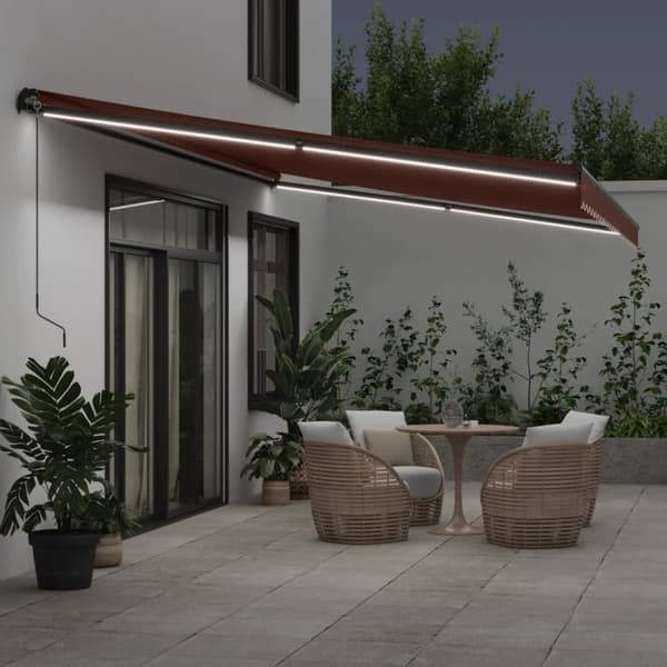 vidaXL Markis manuellt infällbar med LEDs brun 600x350 cm
