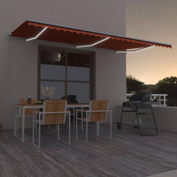 Markis manuellt infällbar med LED 600x300 cm orange och brun
