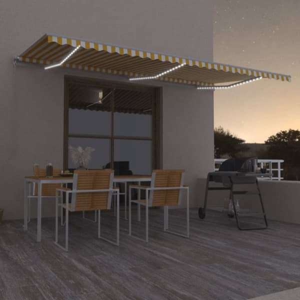 Markis manuellt infällbar med LED 600x300 cm gul och vit