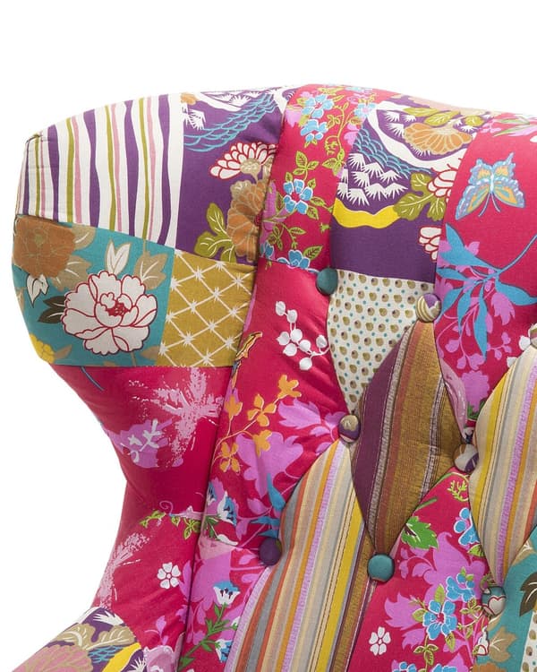Nojatuoli fuksianpunainen monivärinen kangasverhoilu tilkkukuosi nappikoristeltu tikattu wingback retro