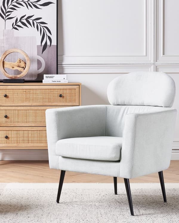 Lysegrå polstret cocktaillænestol sorte ben med nakkestøtte glam retro polstrede stuemøbler