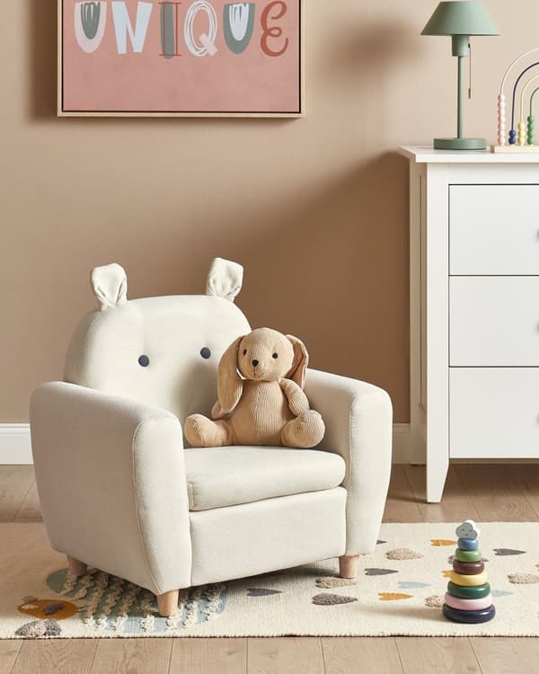 Lasten nojatuoli vaalea beige kangas verhoiltu kumipuu virtahepo lastenhuoneen moderni tyyli