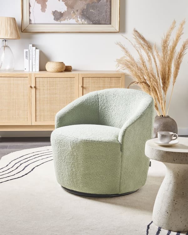 Lysegrøn boucle cocktail lænestol sort drejelig base glam retro lammeskind polstring