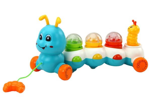 Caterpillar som drar färgglada ljusljud
